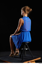 Sarah Kay  blue dress brown high heels casual dressed sitting whole body  jpg
